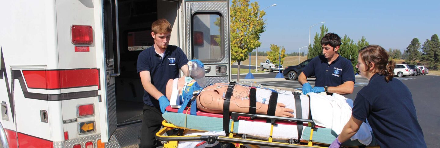 Paramedicine students and ambulance